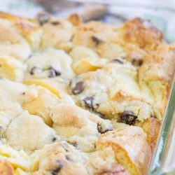 Chocolate chip cookie dough bread pudding in a glass baking dish.