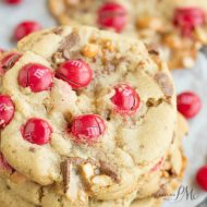 Peanut Butter M&M Snickers Cookies are soft and chewy cookies I filled with peanut butter M&M candies and chopped Snickers candy bars. They are the ultimate sugar rush!