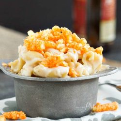 Eight Cheese Mac n Cheese with Cheetos Recipe is cheese on cheese on cheese then topped with crunchy cheesy Cheetos!