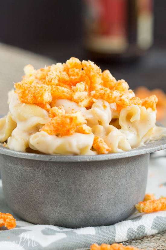 A bowl of indulgent Cheese pasta crowned with crumbled Cheetos for an irresistible crunch.