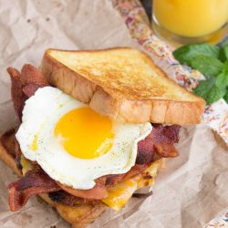 Boy Scout Bacon Hash Brown Breakfast Sandwich recipe is a big, bad breakfast sandwich with all your favorite breakfast foods in one convenient, hand-held package!