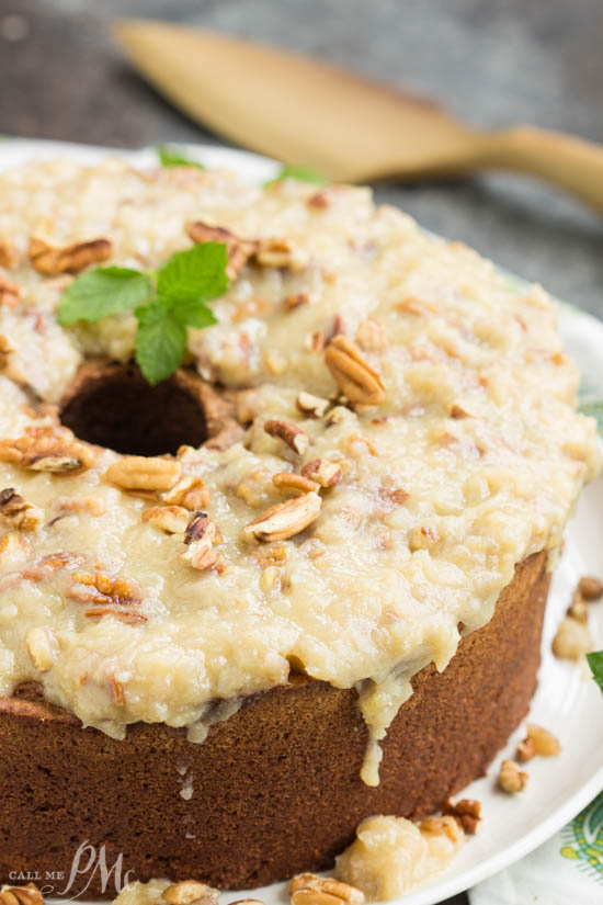 My German Chocolate Pound Cake with Coconut Pecan Frosting recipe is full of rich chocolate then topped with a sweetened coconut and toasted pecan icing.