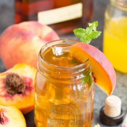 Bourbon Peach Tea Cocktail southern inspired flavors of bourbon and peaches. Turn any party into a celebration with this fun and easy drink!