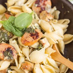 Hearty and flavorful, Creamy Spinach Artichoke Sausage and Chicken Pasta is a 20-minute weeknight meal for your family.