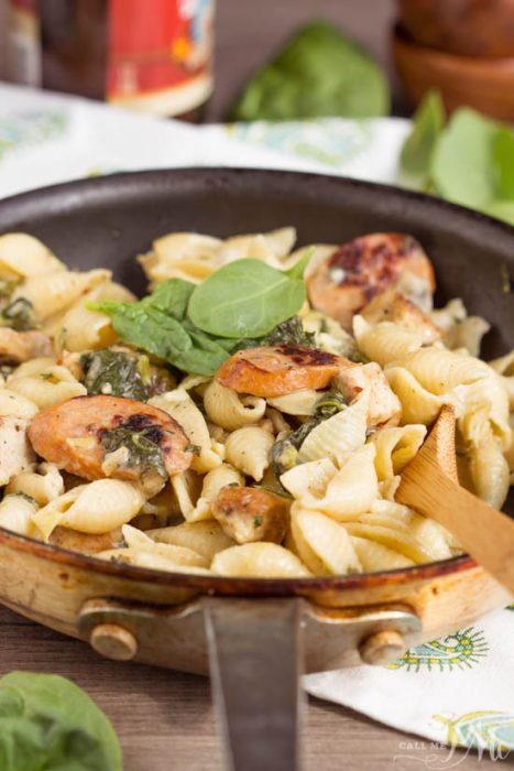Hearty and flavorful, Creamy Spinach Artichoke Sausage and Chicken Pasta is a 20-minute weeknight meal for your family.