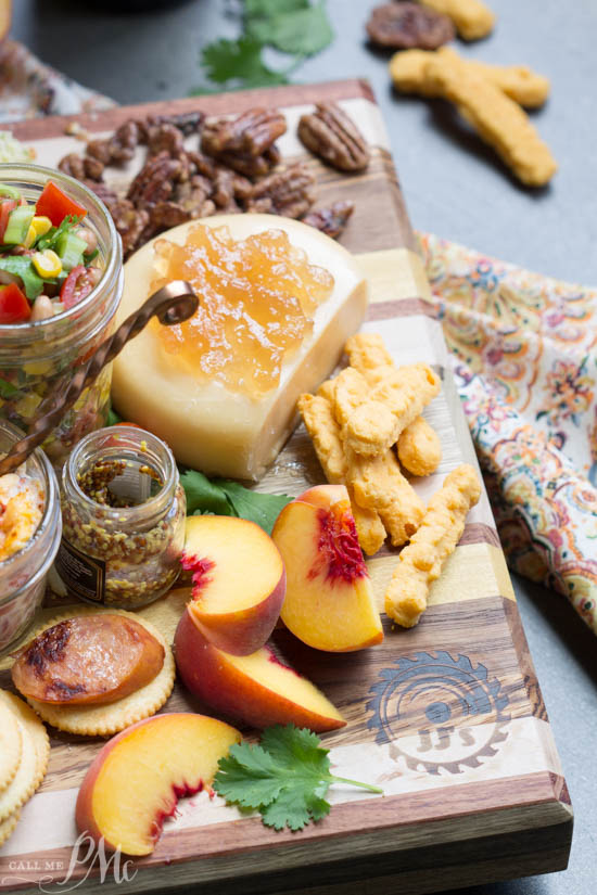 Cheese. Charcuterie. recipe. entertaining. Southern Inspired Cheese Board features crowd-pleasing Southern favorites both sweet and salty, crunchy and creamy for care-free evening entertaining. cheese board