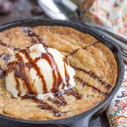 Crave Tupelo Deluxe Chocolate Chip Skillet Cookie has perfectly crispy edges with a gooey, chewy center.