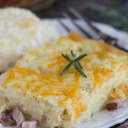 Ham Hashbrown Casserole is an easy, cheesy, hearty breakfast recipe that's loaded with tasty ingredients and no 'cream of' anything soups. It is the ultimate comfort food and great for breakfast, or at any meal!