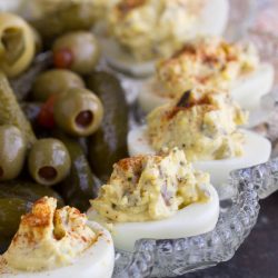 Best Damn Deviled Eggs are creamy and tangy. Classic deviled eggs are easy to make, so delicious, and a flavor bomb appetizer!