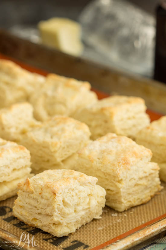 Fluffy and tender Cream Cheese Buttermilk Biscuits are made with butter, cream cheese, and buttermilk. Bake up a batch of this homemade biscuit recipe, they're easy and tasty! #biscuits #breakfast #brunch #bread #Southernfood Biscuits