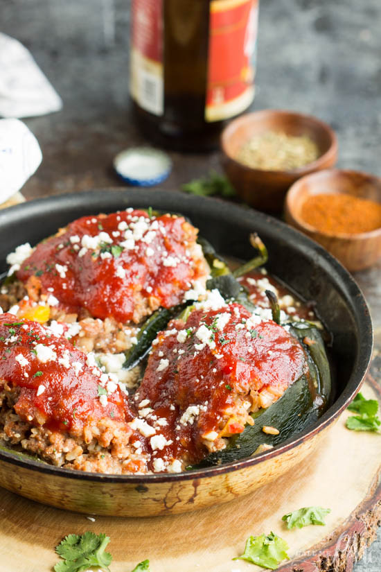 Family favorite. Roasted poblano peppers are stuffed with a hearty meatloaf in this Home-style Meatloaf Stuffed Poblanos recipe. Topped with a rich tomato sauce and tangy feta cheese, this is comfort food at its best. Home-style Meatloaf Stuffed Poblanos in a saucepan.