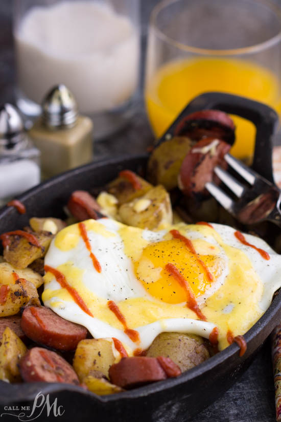 Holiday, indulgent, breakfast. A delicious twist on Eggs Benedict, Sausage Potato Hash Fried Eggs Benedict Recipe has perfect fried eggs over sausage potato hash then topped with an amazing, creamy blender hollandaise. Sausage Potato Hash Fried Eggs Benedict Recipe