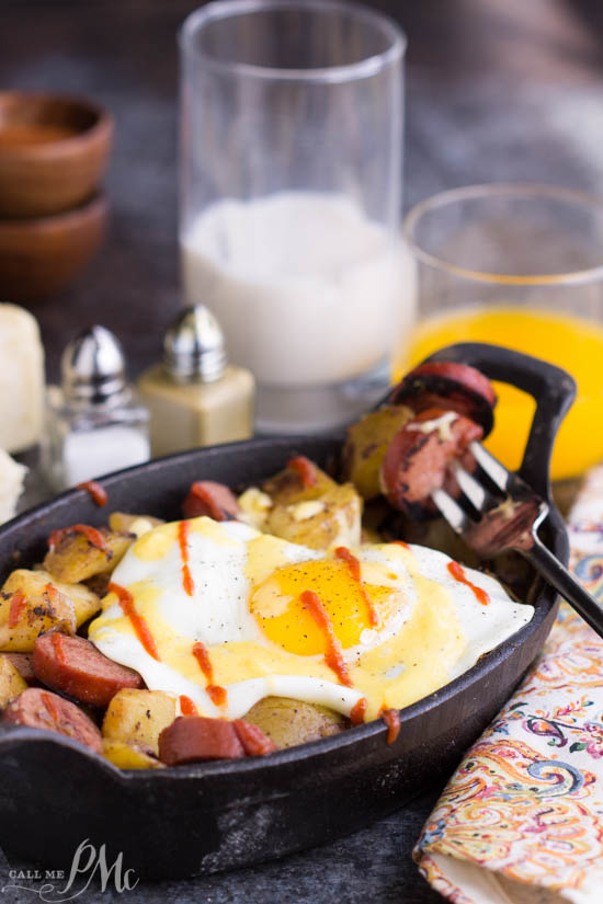 Brunch. entertaining. A delicious twist on Eggs Benedict, Sausage Potato Hash Fried Eggs Benedict Recipe has perfect fried eggs over sausage potato hash then topped with an amazing, creamy blender hollandaise. Sausage Potato Hash Fried Eggs Benedict