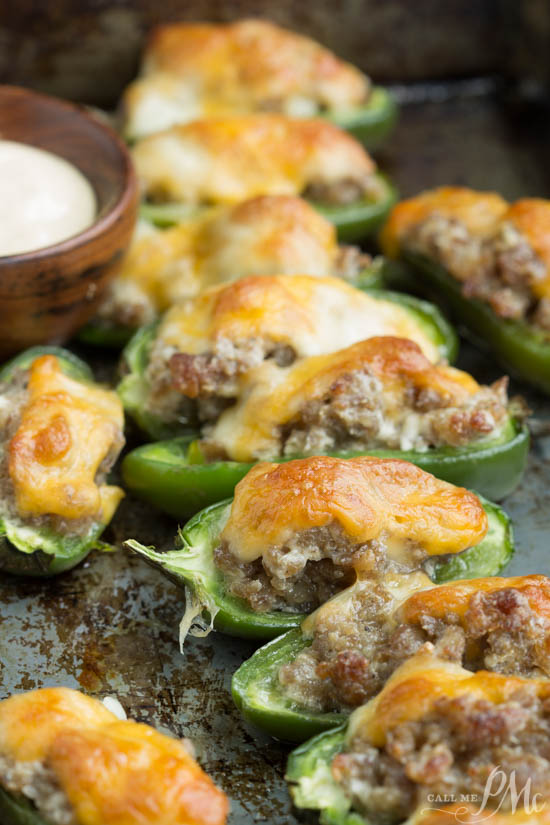 Filled with sausage and topped with cheddar, Baked Fiery Sausage Jalapenos 
