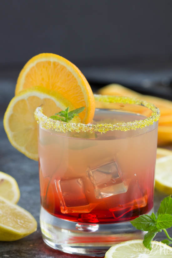 A pretty cocktail, Best Damn Sunset Margarita Cocktail gets it name from the beautiful layered colors. It's fruity and refreshing just what you need to get you through the summer! . drink recipe Sunset Margarita Cocktail