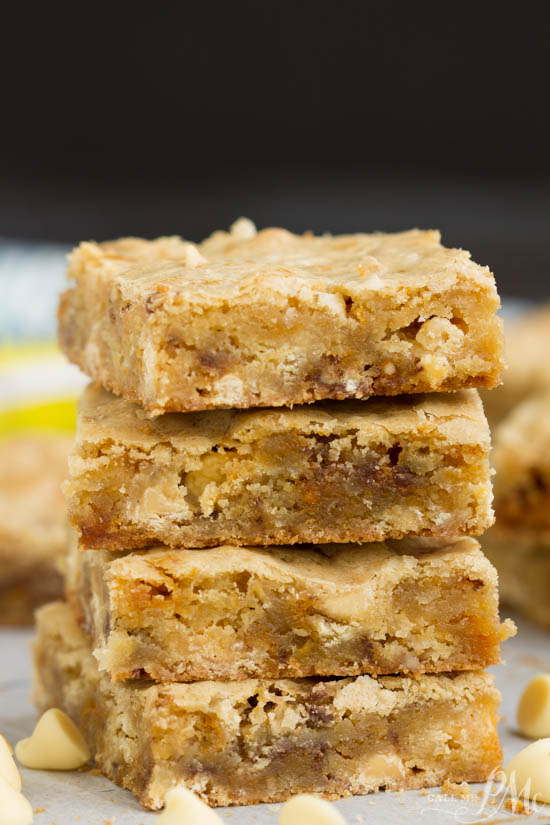 dessert bars. Butterfinger Blondies recipe, these soft and chewy blondies are loaded with white chocolate and rich peanut buttery Butterfingers!ย I'm a big believer in packing blondies to the max with chocolate goodness! Butterfinger Blondies