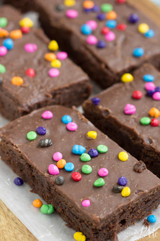Rich, fudgy & covered with bright little sprinkles, these homemade Copycat Little Debbie Cosmic Brownies Recipe taste just like those fudgy lunchbox treats! Little Debbie Cosmic Brownies on a tray.