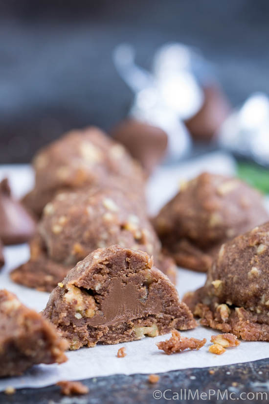 Chocolate Pecan Sandies Secret Kiss Cookies has a secret surprise inside. These luscious chocolate cookies are stuffed with a chocolate kiss. They are for-real amazing! #chocolate #cookie #recipe Chocolate Pecan Sandies