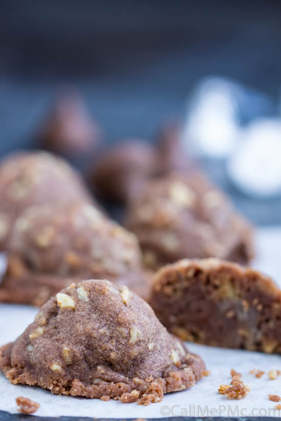 Chocolate Pecan Sandies Secret Kiss Cookies has a secret surprise inside. These luscious chocolate cookies are stuffed with a chocolate kiss. They are for-real amazing! #chocolate #cookie #recipe Chocolate Pecan Sandies Secret Kiss Cookies