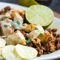 Chori Pollo (Chorizo Chicken) is my restaurant remake of my son's favorite Mexican entree. Chori Pollo is spicy chorizo sausage, grilled chicken, spices, and cheese recipe. You can eat it in soft or hard taco shells, with chips, over rice or greens.