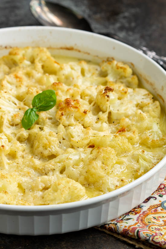 Scalloped Mascarpone Cauliflower is meal-time perfection with its cheesy flavor and creamy texture that elevates this nutritious vegetable to new heights!