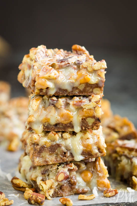 These will not last long at a party! Pecan Pie Magic Cookie Bars with Chocolate Shortbread Crust have a buttery shortbread crust with layers of pecan pie flavors. #dessert #chocolate #pecans
