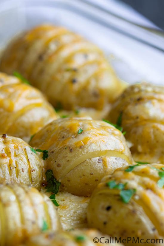 An easy and delicious recipe for cheesy, garlicky, crazy-delicious Hasselback Scalloped Potatoes. They are the perfect side dish for a family dinner!