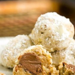 Delightful cookies, this Secret Kiss Cookies recipe will melt in your mouth. They are light, buttery, easy to make, and have a surprise inside.