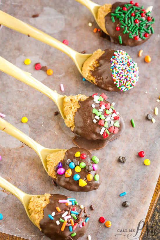 Buckeye Chocolate Peanut Butter Truffle Spoons - Decadent portions of peanut butter truffles dipped in chocolate to stir into hot chocolate or eat as dessert. These spoons are easy to make, fun to make with kids, and make great #gifts. #chocolate #truffles #peanutbutter