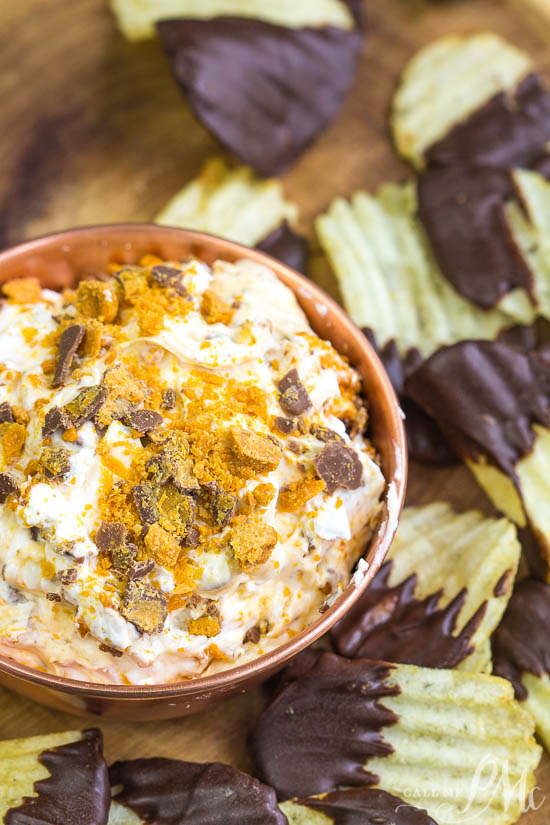 Butterfinger Dip with Chocolate Covered Potato Chips a fun and delicious way to enjoy your favorite candy. It just takes minutes to make. Enjoy it with a sweet and salty combo of Chocolate Covered Potato Chips.