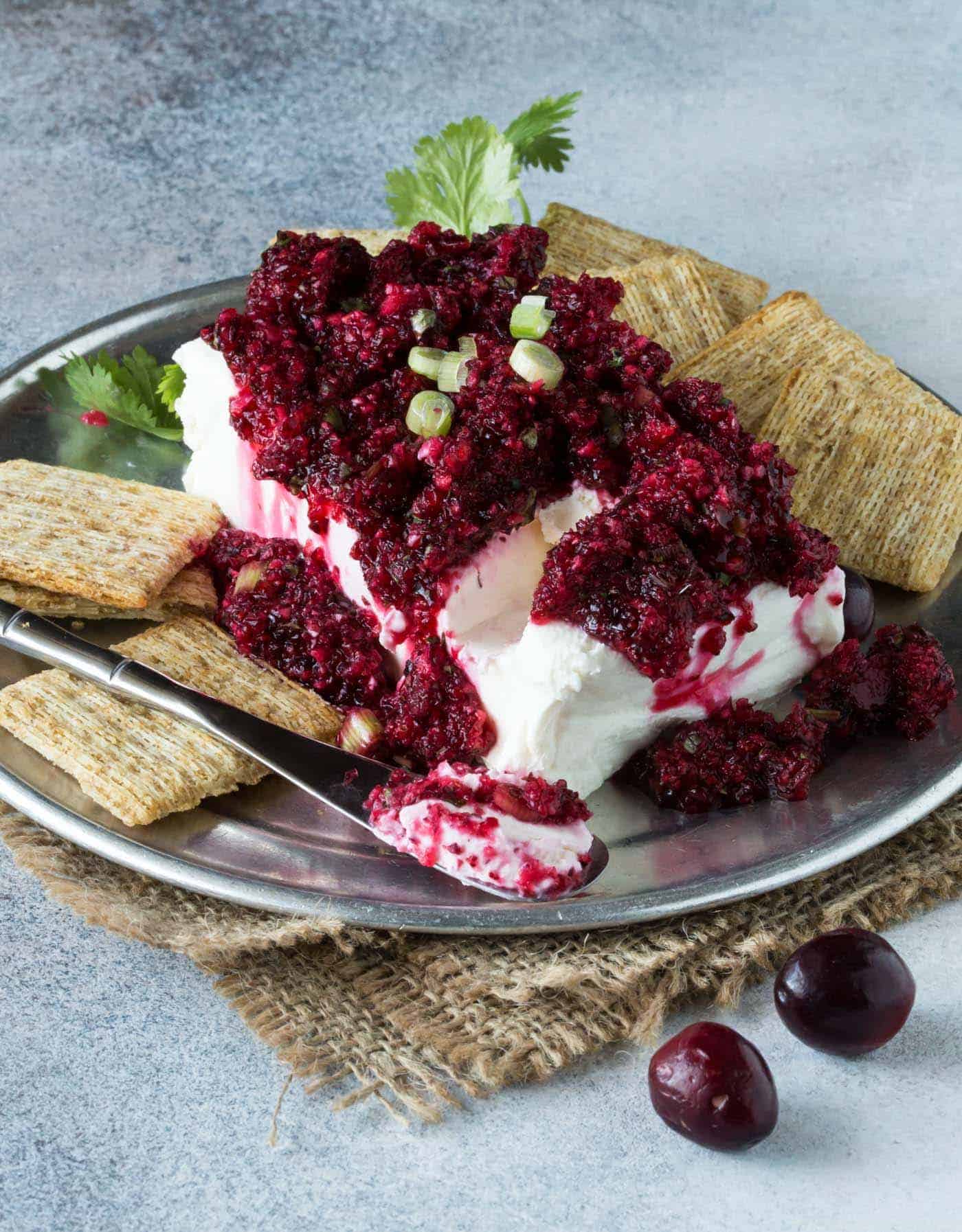 Spicy Cranberry Salsa with Cream Cheese - Easy Block Cream Cheese Appetizer Spreads that make a tasty last-minute appetizer with just a few ingredients. Spicy Cranberry Salsa with Cream Cheese