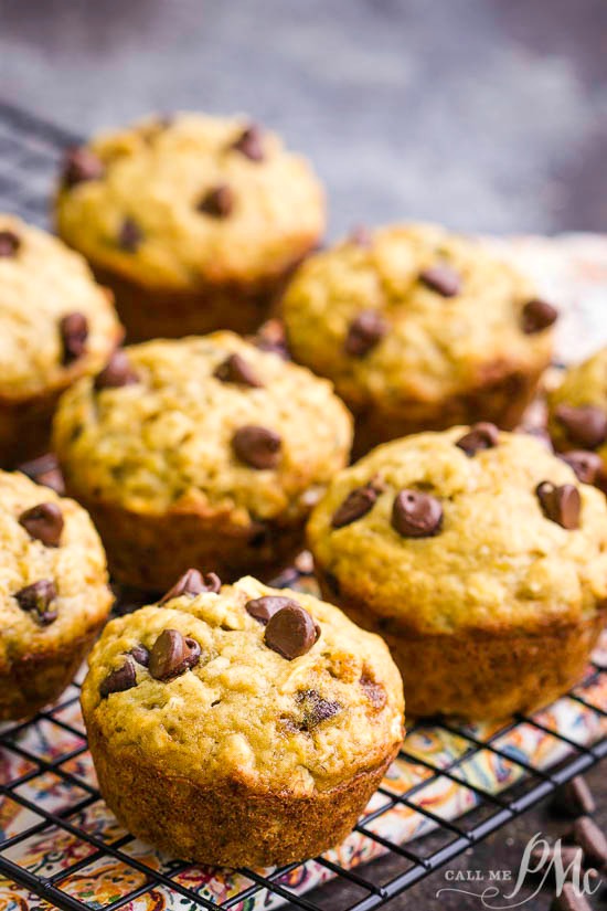 Studded with chocolate chips these Blue Ribbon Banana Bread Muffins are super moist, soft, and fluffy with a sweet banana flavor. #muffin #breakfast #bananabread #chocolate Breakfast cooling on a wire rack.