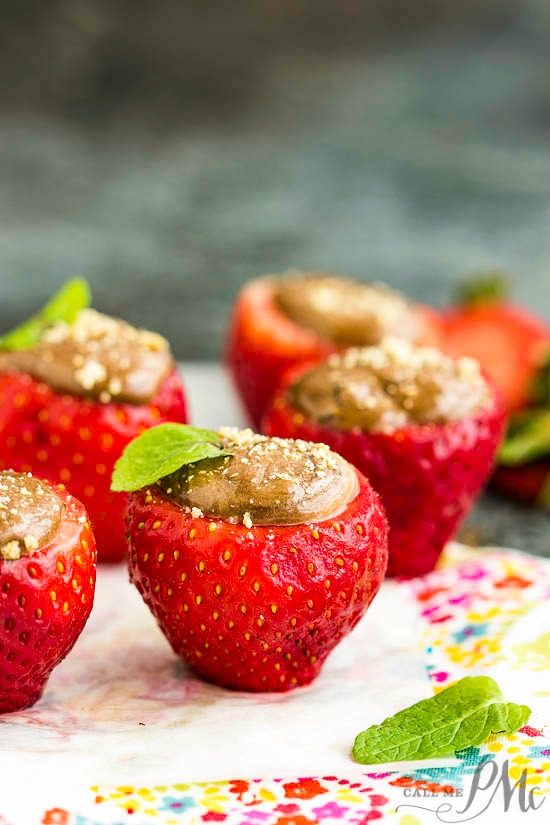 Chocolate Mousse Filled Strawberries, freshly hulled strawberries, stuffed with an amazing chocolate mousse. Enjoy as a snack or serve as a healthy dessert!