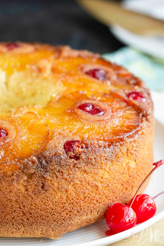 Tube pan baked cake with pineapples and cherries.