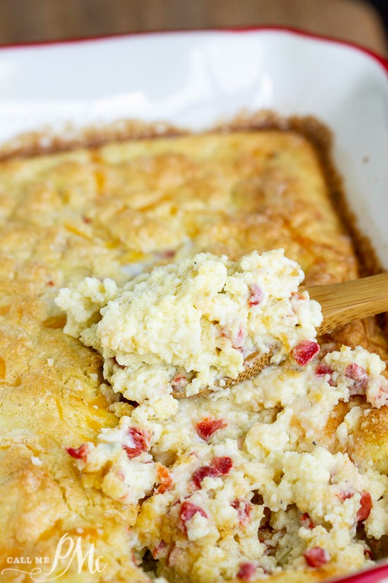 Cottage Egg Casserole in a dish with a spoon.