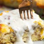 This easy Sausage Gravy Biscuit Bubble Up Casserole is loaded with delicious biscuits baked in a flavorful egg and sausage scramble and topped with gravy! This recipe is great for busy mornings, busy nights, or feeding a crowd.