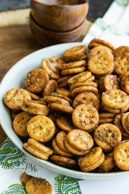 Crunchy, salty, perfectly seasoned, Baked Seasoned Ritz Bits so quick and easy to make. it'll become your new favorite snack! #crackers #snack Crunchy, salty, perfectly seasoned, Baked Seasoned Ritz Bits so quick and easy to make. it'll become your new favorite snack!