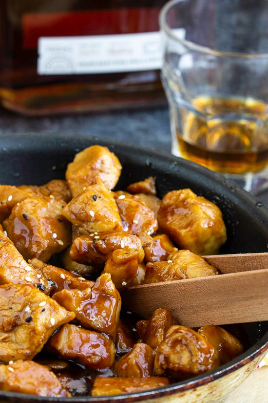 Recipe. Spicy and sweet, Copycat Cajun Cafe Bourbon Chicken Bites are tender chunks of chicken cooked in a bourbon and brown sugar sauce. #appetizer #entree #recipe #chicken Chicken Bites