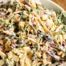 Fresh, vibrant, and healthy, Creamy Mexican Kale Slaw is great as a side or piled high on your tacos.