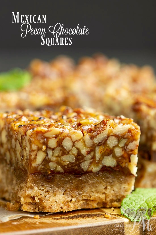 Enjoy these Mexican style Pecan Chocolate Squares that are packed with pecans. They're easy to make, easy to transport, and great for year around noshing. #PecanPie #bars #chocolate Mexican chocolate pecan squares on a cutting board.