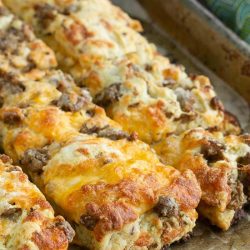 Homemade Sausage Cheddar Biscuits, this portable breakfast has the sausage and cheese baked right in.