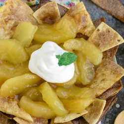 Nachos just reached a new level with Homemade Apple Pie Nachos with Cinnamon Chips. All of the flavors you love in an apple pie, but in a fun and shareable way!