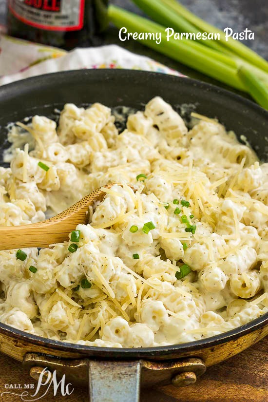 skillet of noodles in creamy white cheese sauce.