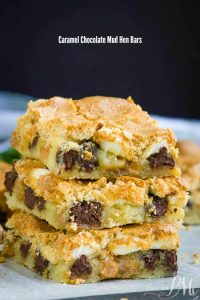 Caramel Chocolate Mud Hen Bars have a cookie bar base topped with marshmallows, chocolate chips, caramel chips, and a brown sugar meringue.