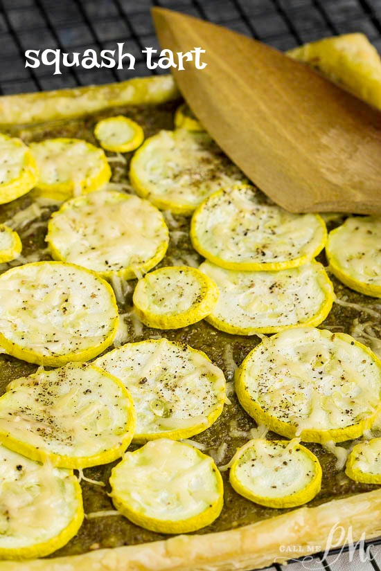 Pesto Squash Tart Recipe, flaky crust and tender summer squash are flavored with pesto, olive oil, and shredded parmesan.