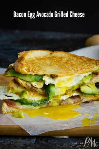 DOUBLE FISTED FRIED EGG BACON AVOCADO GRILLED CHEESE SANDWICH