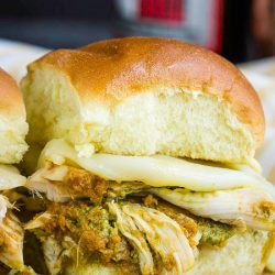 Pull-Apart Pesto Chicken Sliders these baked sandwiches are loaded with juicy chicken and two kinds of pesto. They're great for any party, game day, or snack.