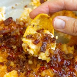 Captain Rodney's Dip is the ultimate party food. This outrageously good dip recipe is what every party, tailgate, and cookout needs! #dip #appetizer #creamcheese #CaptainRodneys #bacon #tailgating #watchparty #easy