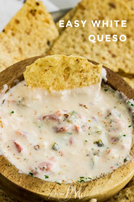 This Easy White Queso Dip recipe is made with three kinds of cheese. It's spicy, creamy, and will become a new family favorite! Be prepared for it to disappear fast! #dip #cheese #cheesedip #recipe #spicy #TexMex #jalapenos #tailgating #gamewatching #parties