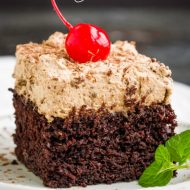 Chocolate Mousse Cake Recipe has a rich chocolate cake topped with a simple to make chocolate mousse that's light and fluffy tops this sheet cake. #cake #chocolate #homemade #fromscratch #easy #mousse #ganache #best #dark #layered